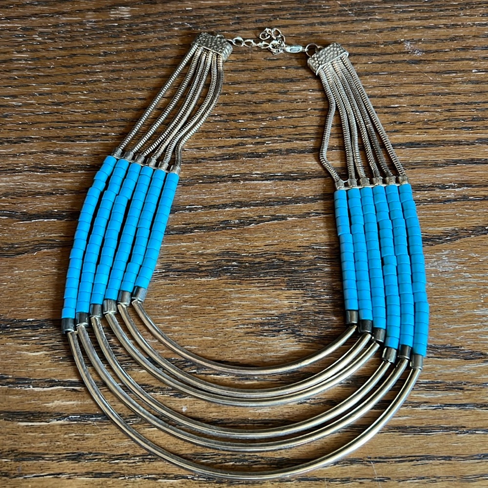 Gold metal and teal beading statement necklace